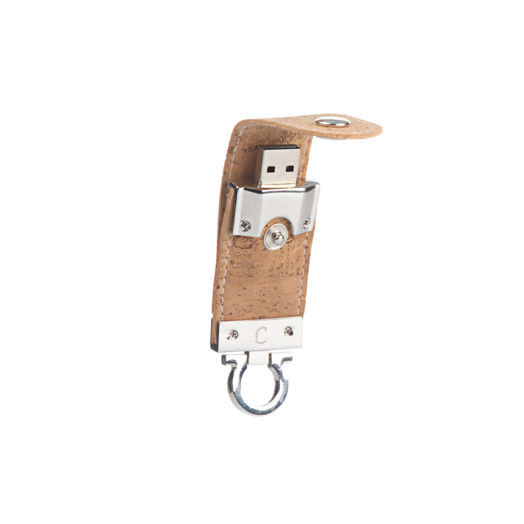 Cork-covered USB flash drive with metal casing and keyring loop on a white background