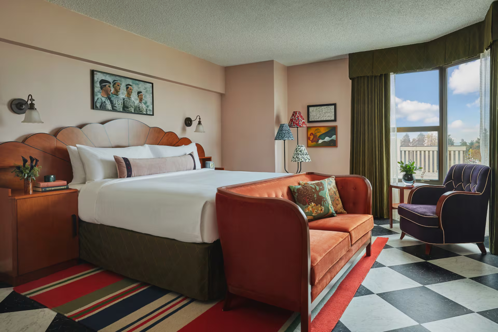 Guest room at Graduate Seattle with academic-inspired decor