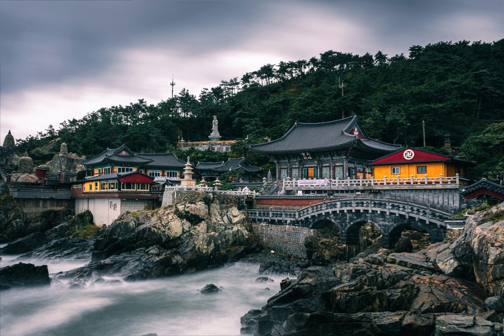 Haedong Yonggungsa Temple on rocky coast in South Korea.