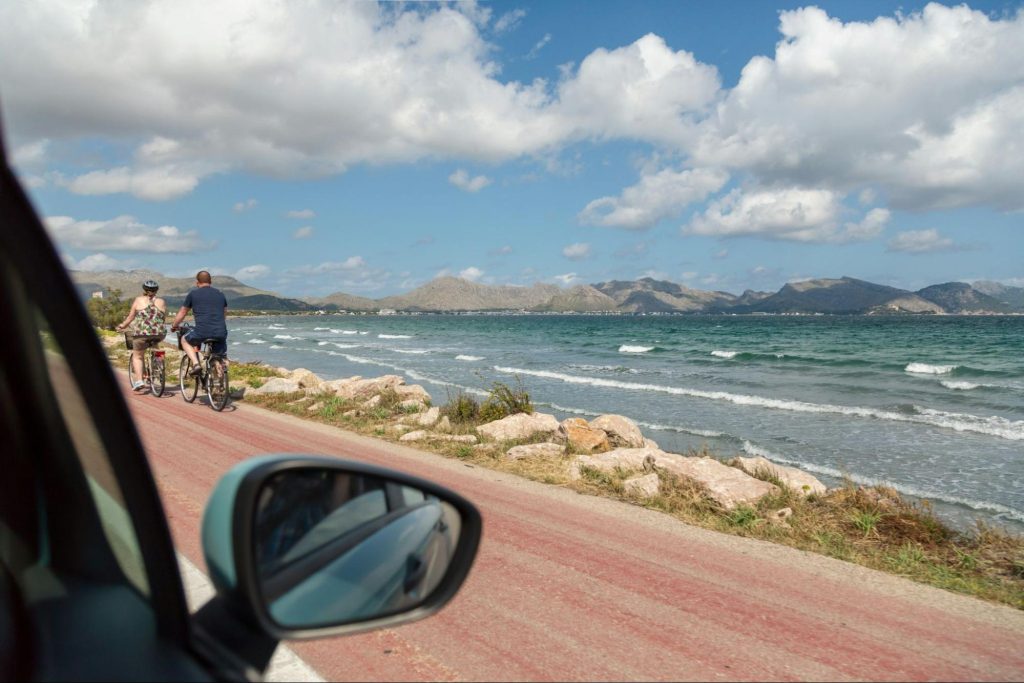 Coastal road in Mallorca with cyclists
