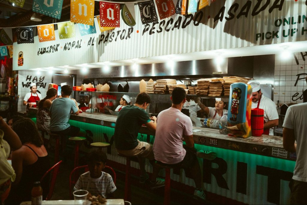 Busy Cuban café counter serving food in Miami