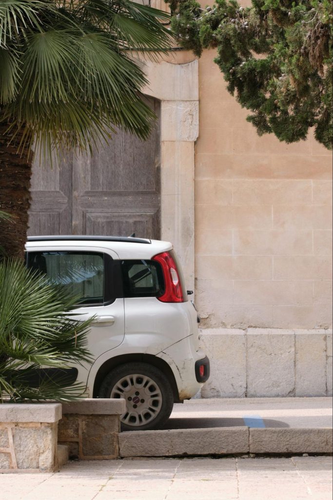 Parked compact car in Mallorca street