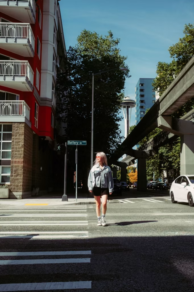 Woman walking in sunny Seattle street