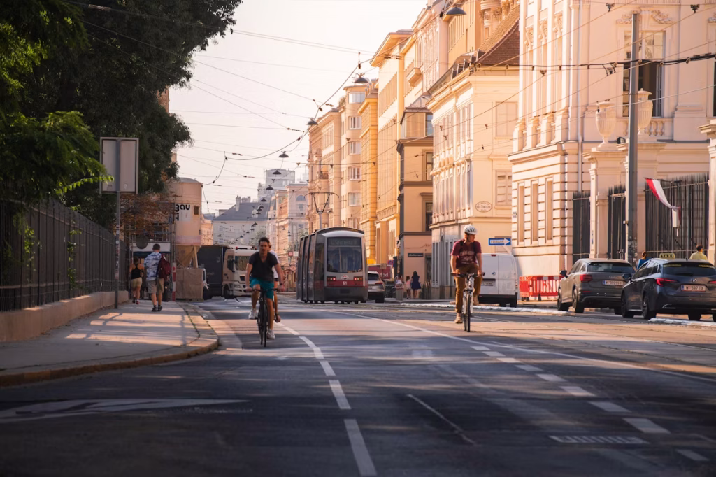 Cyclists and tram on a Vienna city street