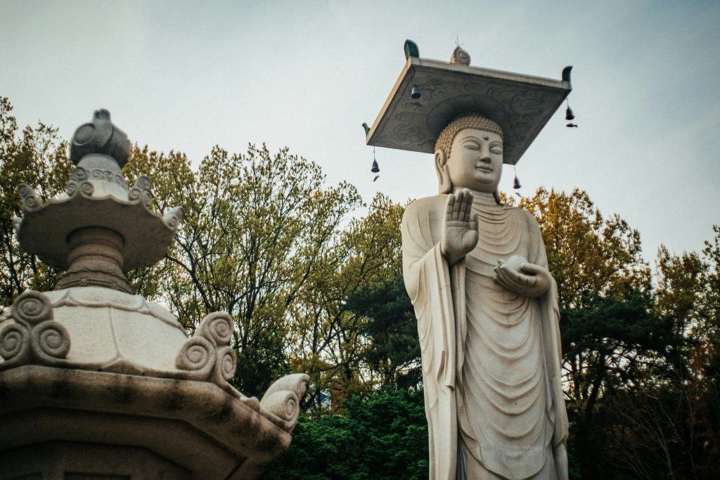 A stone Buddha statue at the peaceful Bongeunsa Temple.